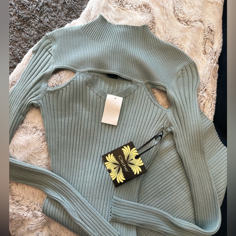 Blueish/green Cliche cutout  sweater dress. Size medium. NWT